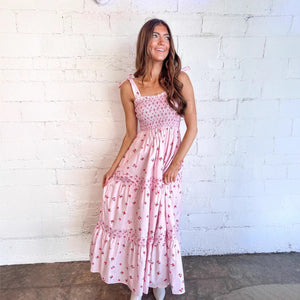 Pink floral printed cake dress for women by Hot Trend Vault, sleeveless with tiered ruffle skirt and feminine floral design.