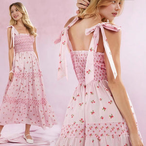 Pink floral printed cake dress for women by Hot Trend Vault featuring sleeveless design and tiered ruffle skirt.