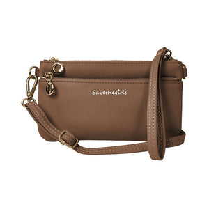 Hot Trend Vault Bella RFID crossbody purse with RFID blocking and smartphone access, shown with sleek design and functional compartments.
