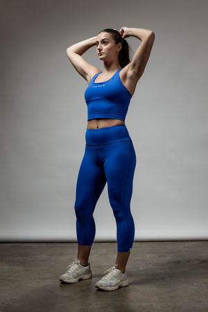 Women's Neo Blue Cross Back Crop Tank Top with built-in support by Hot Trend Vault, featuring a stylish cross back design.