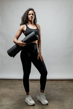 Black SOHO Cross Back Sports Bra for women by Hot Trend Vault, featuring breathable fabric and supportive design for active wear.