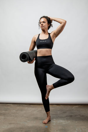 Black SOHO Cross Back Sports Bra for women by Hot Trend Vault, featuring breathable fabric and supportive design for active wear.