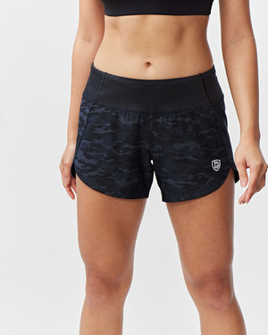 Excel Women's workout shorts with camouflage print, designed for extra coverage during sprints, by Hot Trend Vault.