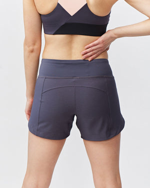 Excel women's workout shorts from Hot Trend Vault in carbon color, designed for extra coverage during sprints and training.