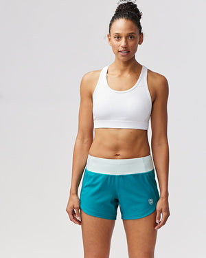 Excel women's workout shorts by Hot Trend Vault in malachite and skylight colors, designed for extra coverage during sprints.