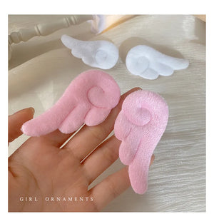 Cute plush hair clips in a 2-pack for girls and kids, from Hot Trend Vault, featuring colorful, soft fabric designs.
