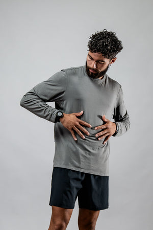 Men's Terra Recovery Field Shirt in stone gray, long sleeve crewneck by Hot Trend Vault, shown in a close-up of the shirt's fabric and design.
