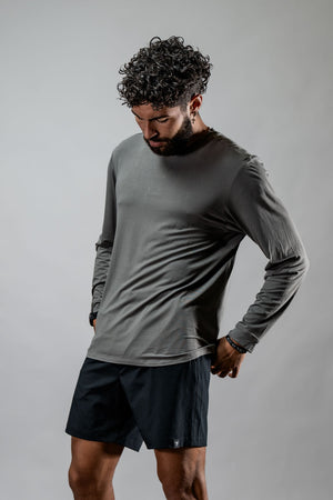 Men's Terra Recovery Field Shirt in stone gray, long sleeve crewneck by Hot Trend Vault, shown on a model.