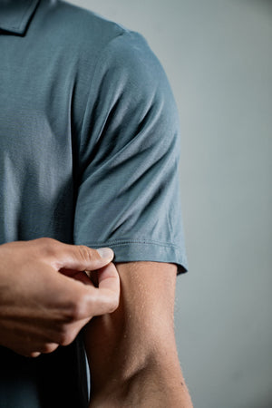 Men's Terra Recovery Polo by Hot Trend Vault in ash gray, featuring a classic polo shirt design with comfortable fit.