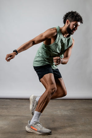 Men's olive green Terra Recovery Tank top by Hot Trend Vault, featuring a low-light, casual design for everyday movement.