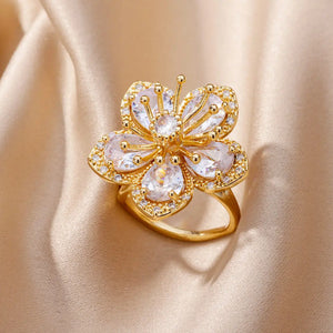 Elegant green zircon flower ring for women by ICFTZWECN, 18K gold plated stainless steel wedding jewelry gift.