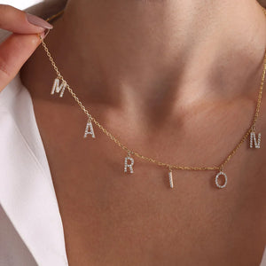 Gold stainless steel V AttractCN custom zircon initial letter name necklace for women, featuring elegant design and sparkling accents.