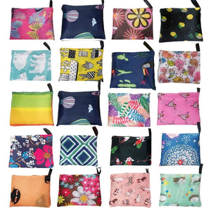 Reusable foldable shopping bag by Hot Trend Vault, large eco-friendly tote with washable, heavy-duty design, suitable for women.