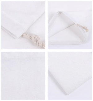 Reusable cotton produce bags with drawstrings by Hot Trend Vault, eco-friendly storage for fruits and vegetables.