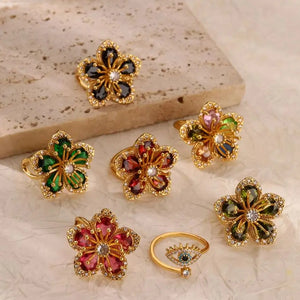 Elegant green zircon flower ring for women, 18K gold-plated stainless steel jewelry by Hot Trend Vault, perfect for weddings or gifts.