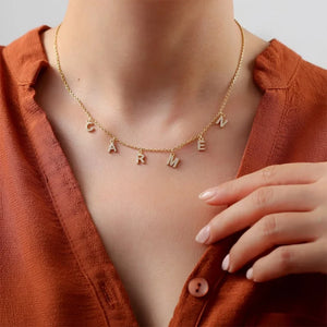 Gold stainless steel initial letter name necklace for women with zircon accents, custom personalized jewelry by Hot Trend Vault.