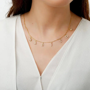 Gold stainless steel initial letter necklace with custom zircon embellishment, designed for women by Hot Trend Vault.