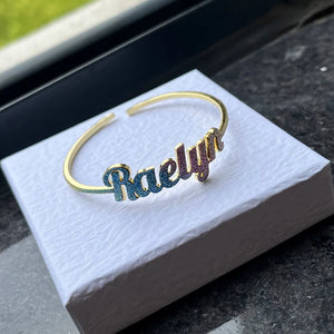 Colorful stainless steel name necklace set for kids with gold nameplate bangles, featuring personalized custom names and vibrant design.