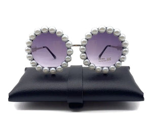 Pearl round sunglasses by VICKICOCO with small oval frame, vintage style, luxury design, worn by women and men.