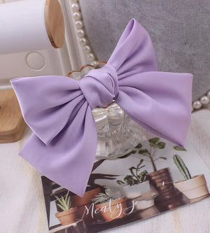 Hot Trend Vault satin bow barrette hair clip with oversized knot, elegant hair accessory for women, stylish hairgrip.