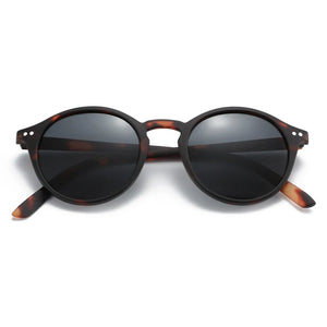 Unisex vintage polarized sunglasses with UV400 protection and classic design, ideal for driving and outdoor activities.