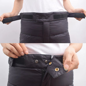 Lightweight winter hiking down pants for men and women by Hot Trend Vault, showcasing the warm, insulated outerwear in a natural outdoor setting.