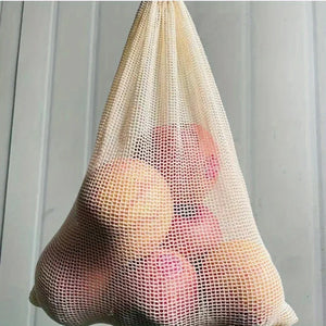 Hot Trend Vault cotton mesh reusable produce bags, eco-friendly and chemical-free for eco-conscious shoppers, shown in natural use.