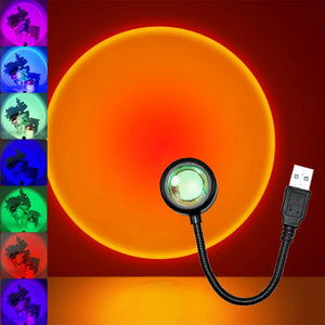 Hot Trend Vault Sunset Lamp Projector displaying colorful rainbow light on a wall for romantic ambiance.