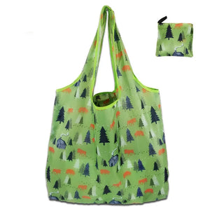 Large eco-friendly foldable tote shopping bag for women by Hot Trend Vault, shown in its compact carrying case.