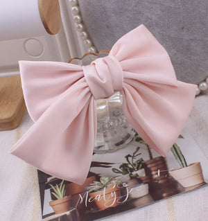 Elegant satin bow barrette by Hot Trend Vault featuring an oversized knot hair clip for women, perfect for stylish hair accessories.