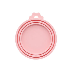 Reusable silicone pet can lid for dogs, BPA-free and durable, shown in a close-up image with the lid fitting over a pet food can.