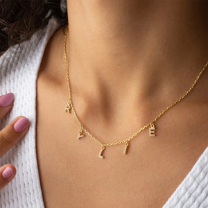 Gold stainless steel initial letter necklace for women, custom zircon name necklace by Hot Trend Vault.