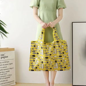 Large, eco-friendly reusable foldable shopping bag by Hot Trend Vault, featuring a durable design and spacious tote for women.