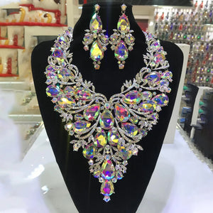 StoneFans rhinestone drop necklace and earrings set for women, featuring exaggerated drag queen glam style with sparkling stones.