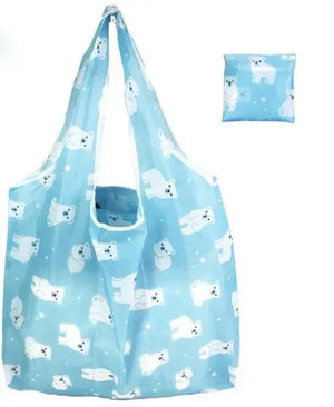 Large eco-friendly foldable reusable shopping bag for women by Hot Trend Vault, shown in its compact case.