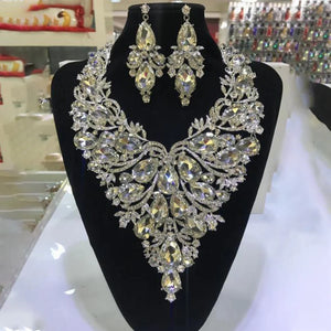 StoneFans rhinestone drop necklace and earrings set for women, featuring glamorous exaggerated drag queen style and sparkling embellishments.