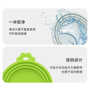 Reusable BPA-free silicone pet can lid for dogs, durable and flexible, shown on a metal can in the image.