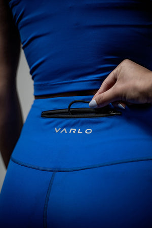 Women’s Soho 3/4 leggings in Neo Blue by Hot Trend Vault, featuring a comfortable fit and studio-ready style.