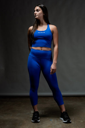 Women’s Soho 3/4 leggings in Neo Blue by Hot Trend Vault, featuring a comfortable, studio-ready fit and stylish design.
