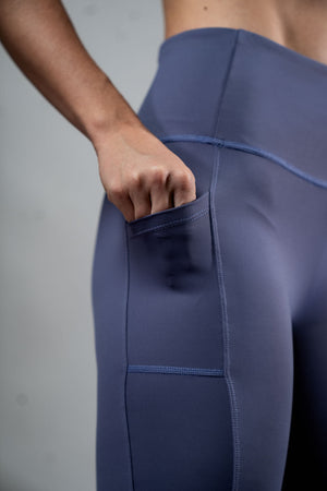 Women wearing Hot Trend Vault SOHO Fitness Shorts, 8-inch length in Lilac Mist, designed for all-day comfort and active wear.
