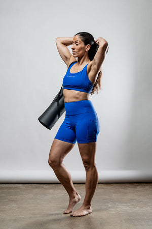 Women’s Neo Blue Soho Cross Back Sports Bra by Hot Trend Vault, breathable and supportive activewear for women.