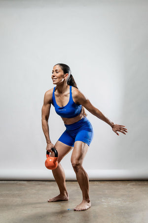 Women wearing Neo Blue Cross Back Sports Bra by Hot Trend Vault, breathable and supportive activewear for women.