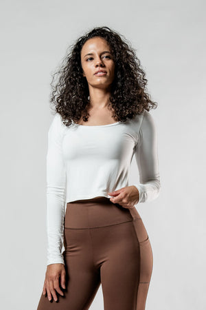 Women's Terra Recovery Arc Long Sleeve Crop T-Shirt by Hot Trend Vault in soft white fabric, showing fitted design and long sleeves.