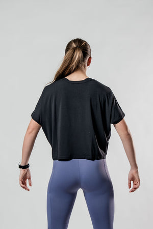 Black Women's Terra Recovery Drift Crop T-Shirt by Hot Trend Vault, relaxed fit athleisure style, displayed on a model.