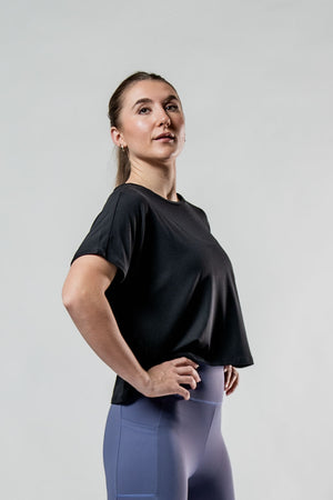 Black women's Terra Recovery Drift crop T-shirt by Hot Trend Vault, relaxed fit athleisure style, shown on model.
