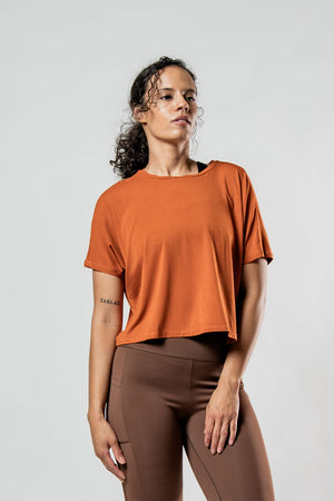 Women's Terra Recovery Drift Crop T-Shirt in Sunfire Clay by Hot Trend Vault, featuring a relaxed silhouette and casual style.
