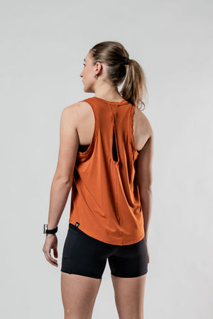 Women's Terra Halo Recovery Tank top in Sunfire Clay by Hot Trend Vault, breathable fabric, casual fit, and sleeveless design.