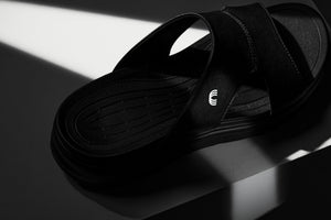 Black grainy Calto X1655 height increasing sandals by Hot Trend Vault, showing the stylish sandals with a 2-inch lift.
