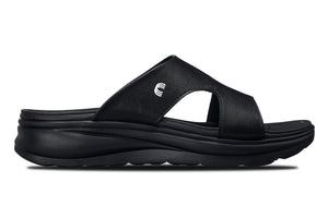 Black Calto X1655 height-increasing sandals by Hot Trend Vault with grainy finish and 2-inch lift for added height.