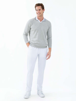 Men's white tennis pants by Hot Trend Vault, performance quick-dry fabric with zippered leg openings, ideal for active sports.